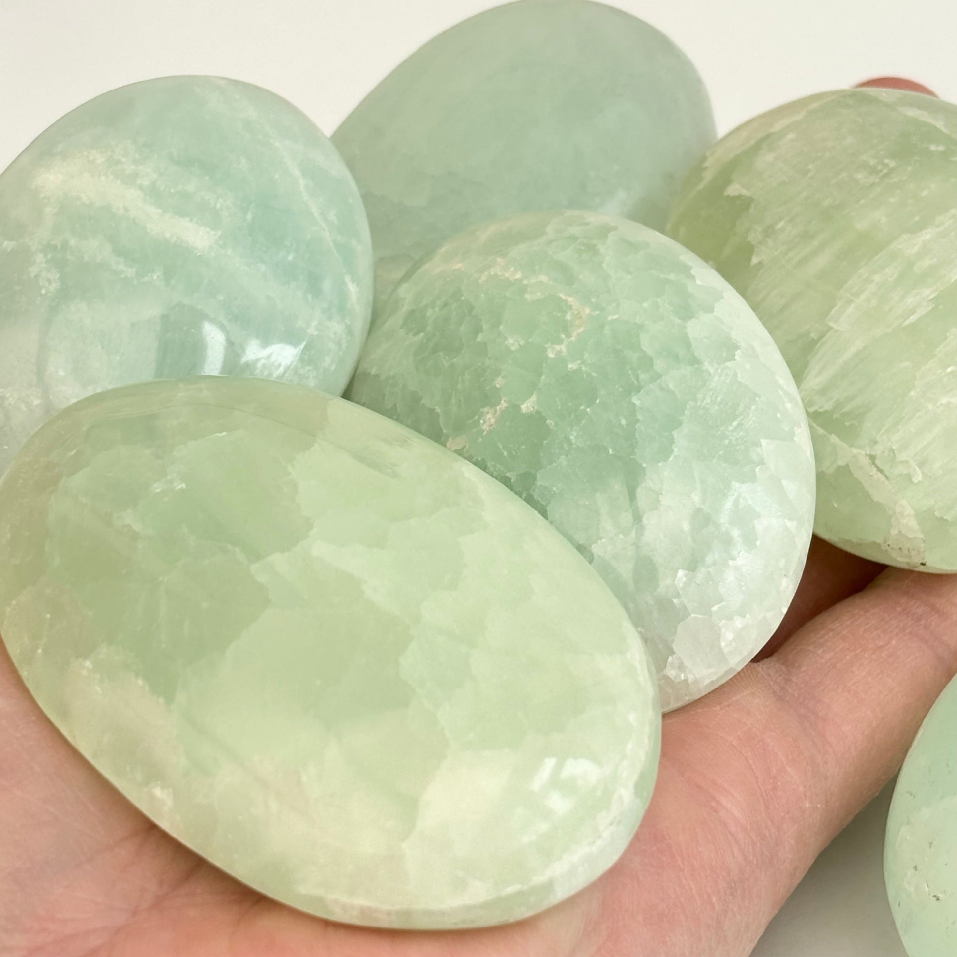 Pistachio Calcite Palmstones from UK Wholesale Crystals